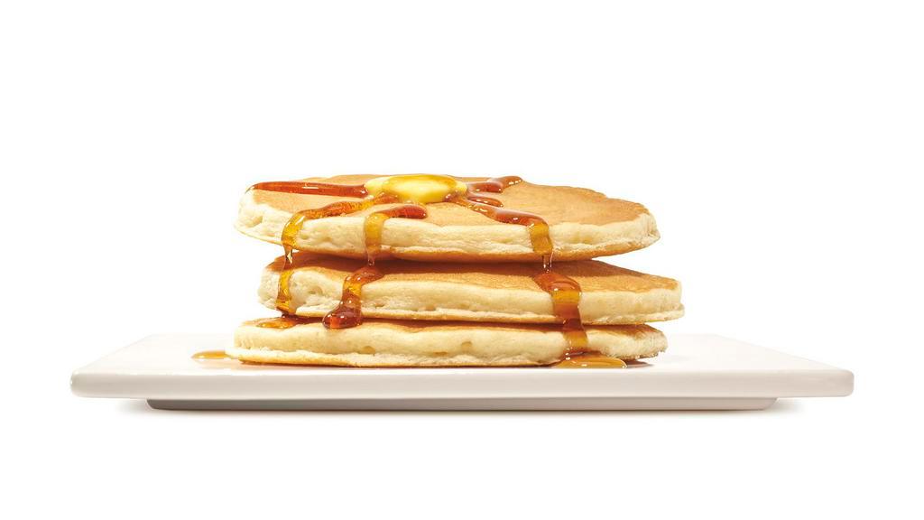 Pancakes · Fresh from the kitchen, three fluffy pancakes drizzled in sweet syrup.