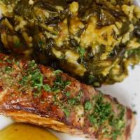Organic Salmon · Grilled, extra virgin olive oil and lemon, capers, served with spinach and rice.
