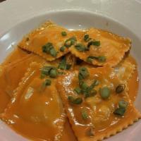 Lobster Ravioli · Lobster ragout and ricotta in creamy tomato sauce.