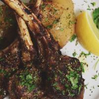 Lamb Chops · 3 rack of lamb served with roasted lemon potatoes and grilled asparagus.