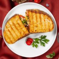 Colonial Panini  · Panini filled with chicken cutlet, mozzarella cheese, lettuce, tomato and 1000 island dressi...