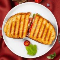 Italian Panini · Panini filled with grilled chicken, fresh mozzarella, and roasted peppers.