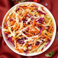 Coleslaw · (Vegetarian) Shredded cabbage and carrots dressed in mayonnaise and apple cider vinegar.