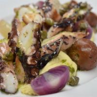 Octopus · Grilled Spanish octopus, shallots, capers, cherry tomatoes, fava.