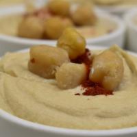 Hummus · Smoked Paprika, marinated chickpeas, micro cilantro.