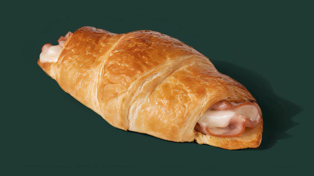 Ham & Cheese Croissant · Hickory-smoked ham and melted Swiss cheese enveloped in our buttery signature La Boulange croissant. A French classic available at your closest Starbucks.