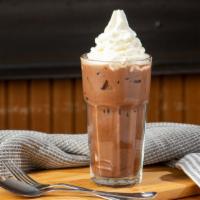 Iced Caffè Mocha · Espresso combined with bittersweet mocha sauce and milk over ice. Topped with sweetened whip...