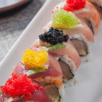 *Gramercy Roll · Crunchy spicy albacore tuna and jalapeños wrapped with tuna, yellowtail and salmon, topped w...