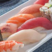 *Sushi With California Roll†  · 2 tuna, whitefish, salmon, yellowtail,. albacore tuna, shrimp, tobiko caviar, and California...