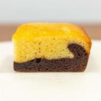 Bibingka Brownie · Two layers of brownie magnificence.  Classic fudge brownie with bibingka baked on the top la...