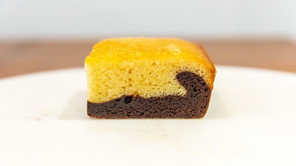 Bibingka Brownie · Two layers of brownie magnificence.  Classic fudge brownie with bibingka baked on the top layer.  

bibingka is a Filipino baked rice cake similar to mochi but ours is a lighter in texture.