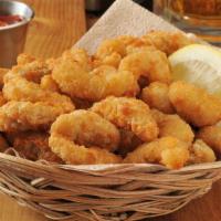 Shrimp Fries · Golden crispy fries salted and fried to perfection and topped with fried shrimp and melted c...