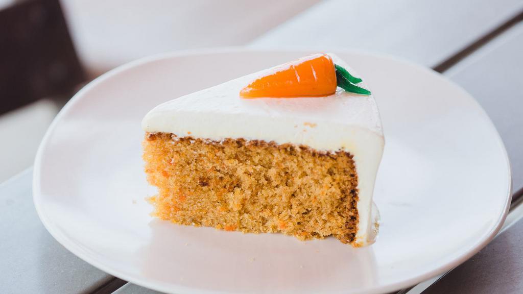 Carrot Cake · Moist cake, spiced with cinnamon and frosted with cream cheese.