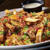 Fully Loaded Cheese Fries · Monterey Jack and cheddar cheeses, applewood-smoked bacon, scallions, ranch dressing.