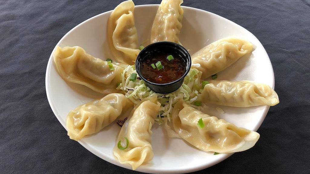 Steamed Potstickers · Pan fried or steamed; Pork dumplings, shredded cabbage, scallions, sweet Thai chili sauce.