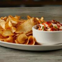 Loaded Dip & Chips · Sour cream, applewood-smoked bacon, Monterey Jack and cheddar cheeses, green onions, finishe...