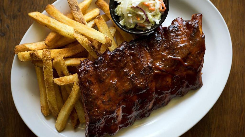 Barbeque Baby Back Ribs- Half Rack · Slow roasted, tender to the bone, basted in sweet and tangy bbq sauce, coleslaw.