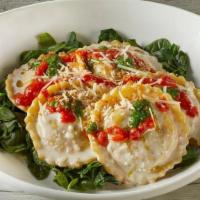 Chicken Pesto Raviolo · Chicken pesto raviolo, Parmesan cream sauce, drizzled with roasted tomato- red pepper sauce ...