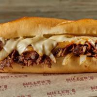 Philly Cheese · Grilled, sliced beef, sautéed onions, melted white American cheese, hoagie roll.
