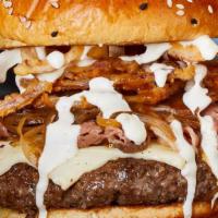 Prime Burger* · Melted white American cheese, shaved prime rib, roasted mushrooms, sautéed onions, gravy, cr...