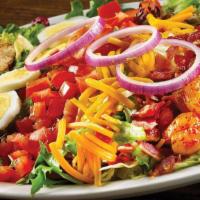 Blackened Shrimp & Chicken Cobb Salad · Field greens, hard-boiled egg, Monterey Jack and cheddar cheeses, Roma tomatoes, red onion, ...