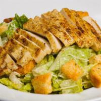 Grilled Chicken Caesar Salad · Shredded Parmesan, Croutons, Crisp Romaine.