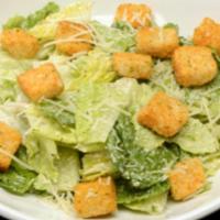 Caesar Salad · Shredded Parmesan, croutons, crisp romaine, Caesar dressing.