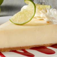 Key Lime Pie · Graham cracker crust, fresh lime and garnished with raspberry puree.