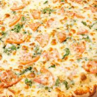 Tomato And Spinach Pizza · White garlic sauce, sliced tomato, fresh spinach and mozzarella cheese.