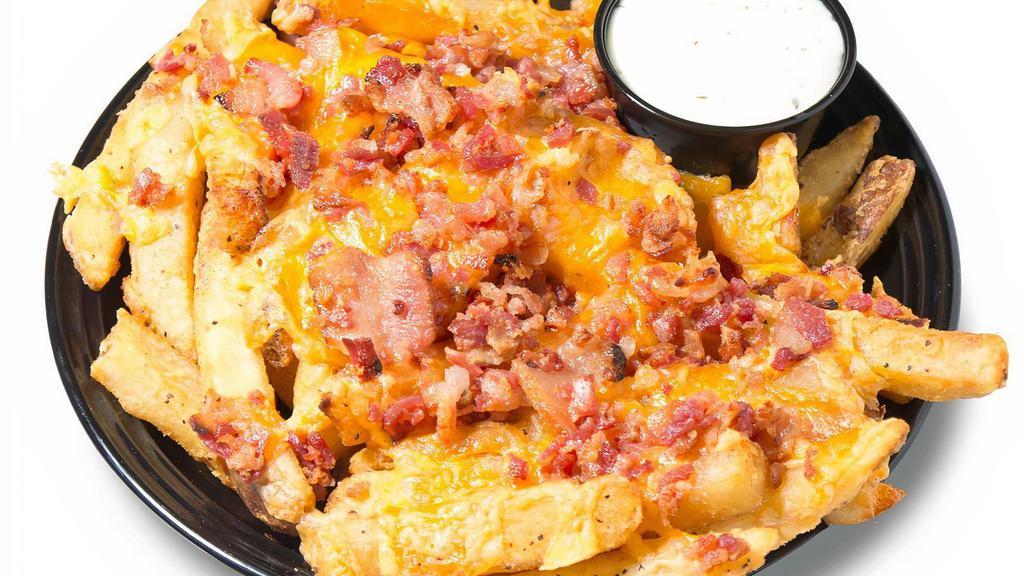 Perri'S Bacon Cheddar Fries · Our jersey fries covered in shredded cheddar cheese topped with chopped bacon then oven baked! Served with ranch dressing.