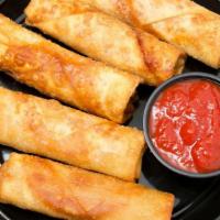 5 Pieces Pizza Logs · Everyones go to favorite pepperoni and cheese stuffed appetizer, served with pizza sauce.
