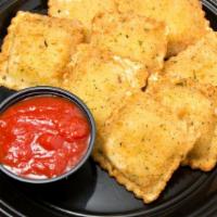 8 Pieces Fried Ravioli · Cheese filled and lightly breaded deep fried raviolis, served with pizza sauce.