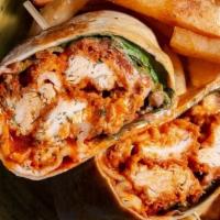 Buffalo Chicken Wrap · Breaded chicken tossed in buffalo sauce w/ lettuce, tomato, and drizzled w/ blue cheese
