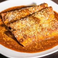 3 Piece Enchiladas In Mole Poblano · Our spicy brown traditional homemade recipe. Prepared with your choice of marinated chicken,...