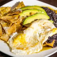Chilaquiles Verdes · Very spicy. Homemade corn chips smothered with our homemade spicy tomatillo sauce, served wi...