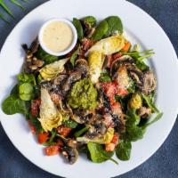 Spinach Salad · Bed of baby spinach with selected toppings.