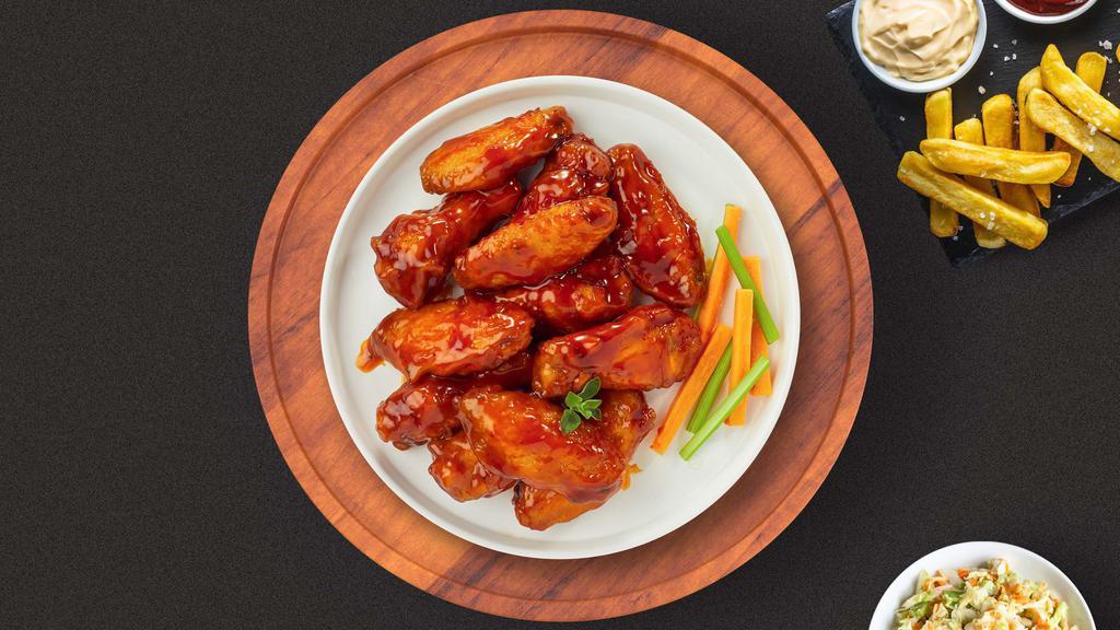 Buffalo Rider Wings · Fresh chicken wings breaded, fried until golden brown, and tossed in buffalo sauce. Served with a side of ranch or bleu cheese.