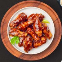 Beast Bbq Wings · Fresh chicken wings breaded, fried until golden brown, and tossed in barbecue sauce. Served ...