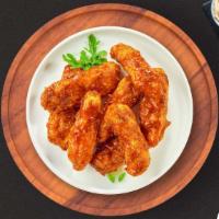 Beast Bbq Tenders · Chicken tenders breaded and fried until golden brown before being tossed in barbecue sauce.
