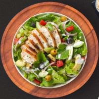 Barrio Bistro Salad · Grilled chicken breast with romaine lettuce, crumbled feta cheese, walnuts, and topped with ...