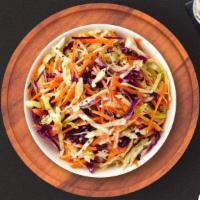 Abide Coleslaw · Shredded cabbage and carrots dressed in mayonnaise and apple cider vinegar.