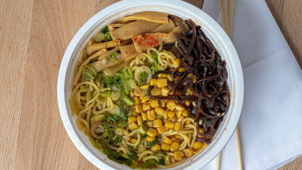 Vegan Miso · Vegan miso broth and soy cream wavy noodles, scallions, sweet corn, wood ear mushrooms, bamboo shoots, bean sprouts topped with black pepper and seaweed garnish.