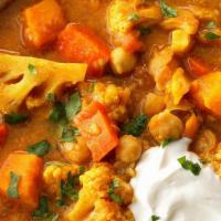 Vegan Curry · Creamy vegetable curry over rice, smoked tofu, eggplant, zucchini, mushrooms, potatoes, carr...