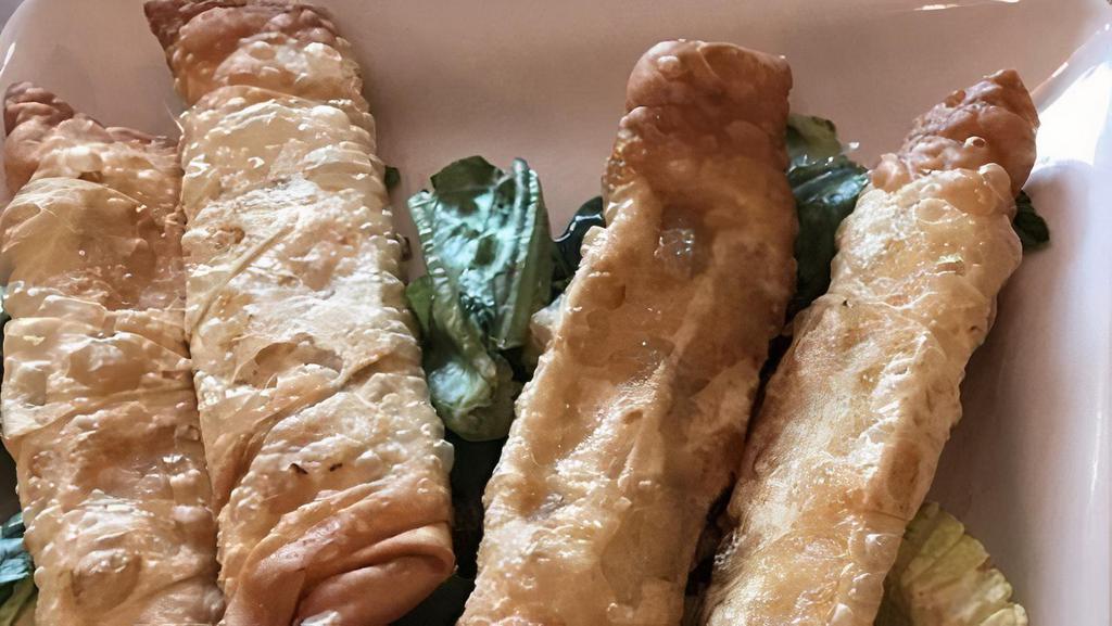 Sigara Borek · Lightly pan-fried phyllo rolls stuffed with feta cheese.