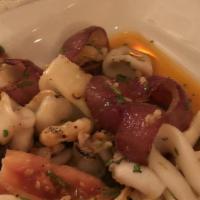 Calamari · Lightly pan-fried calamari served with special sauce.
