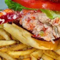 Lobster Blt  · On a brioche bun with french fries.