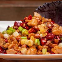 Kung Pao Chicken · Contains peanuts. Spice level one. Slightly sweet, spicy chicken cubes sautéed with green an...