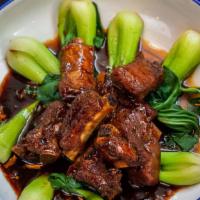Baby Back Ribs (Pork) · Braised baby back ribs. Incredibly tender, slow cooked in a sweet dark sauce.