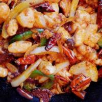 Griddle Cooked Spicy Pot (Chicken) · Spice level three. Griddle cooked pot, zing of Sichuan peppercorn along with the heat of chi...