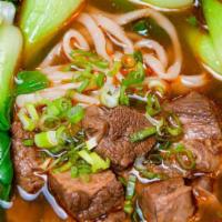 N2 Lanzhou Braised Beef Noodles · Hand pulled noodles in soup and beef cubes in dark sauce. Our braised beef melts in your mou...